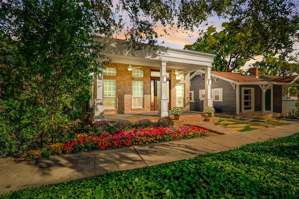 Newly Renovated, Custom Home. Landscaping has been virtually added to show a similar representation to landscaping to be installed.