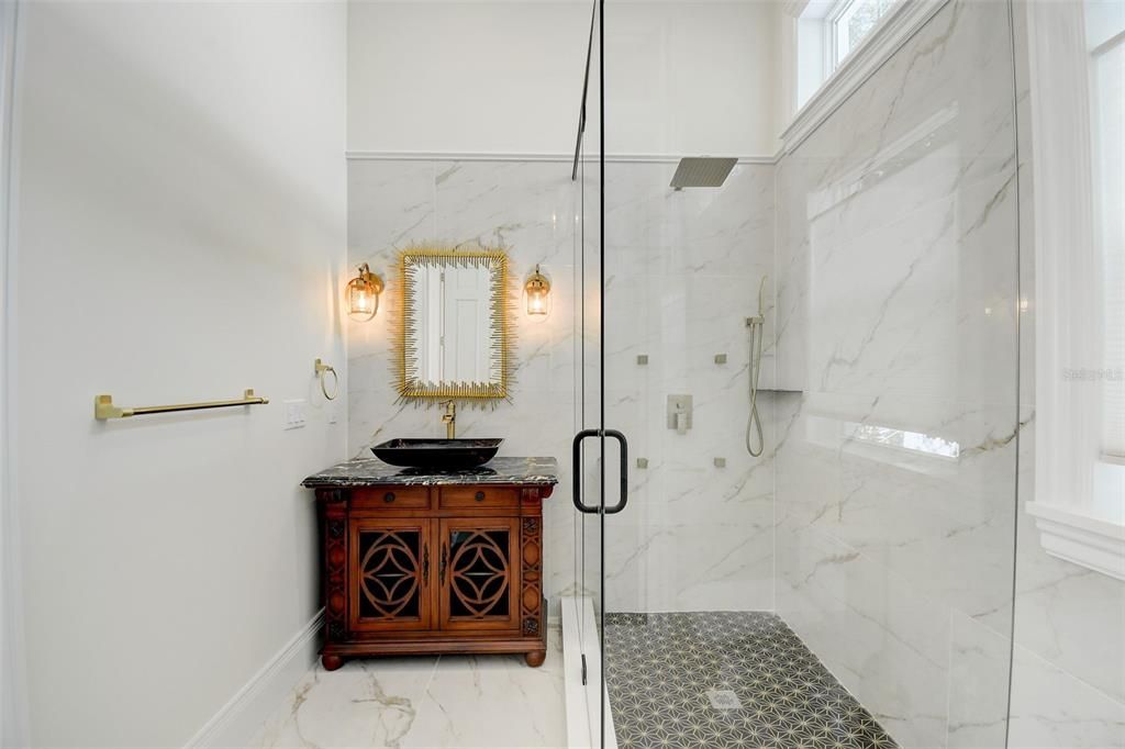 Stunning Hall/Guest Bath can be accessed by both the hallway door & by door from 2nd Bedroom!