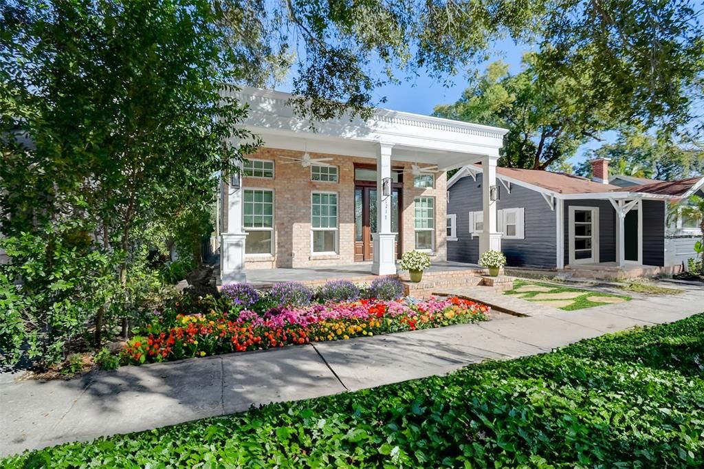 Newly Renovated, Custom Home. Landscaping has been virtually added to show a similar representation to landscaping to be installed.