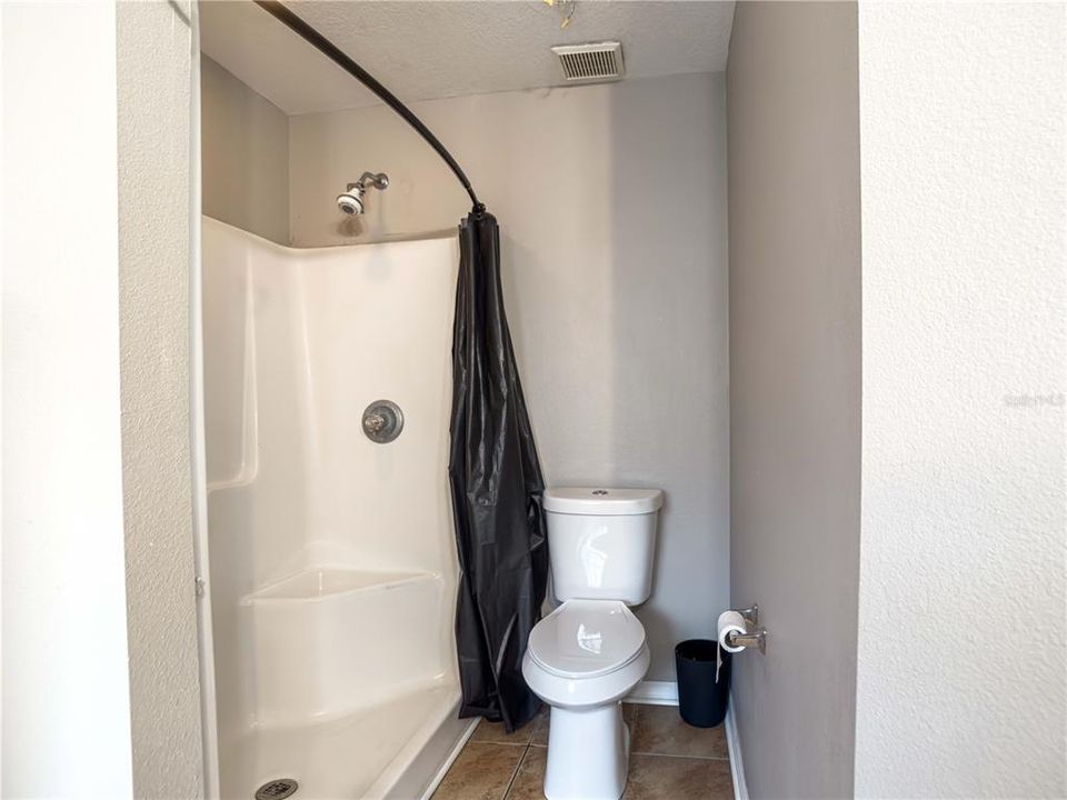 Primary Bathroom W/ Tub & Stand up Shower