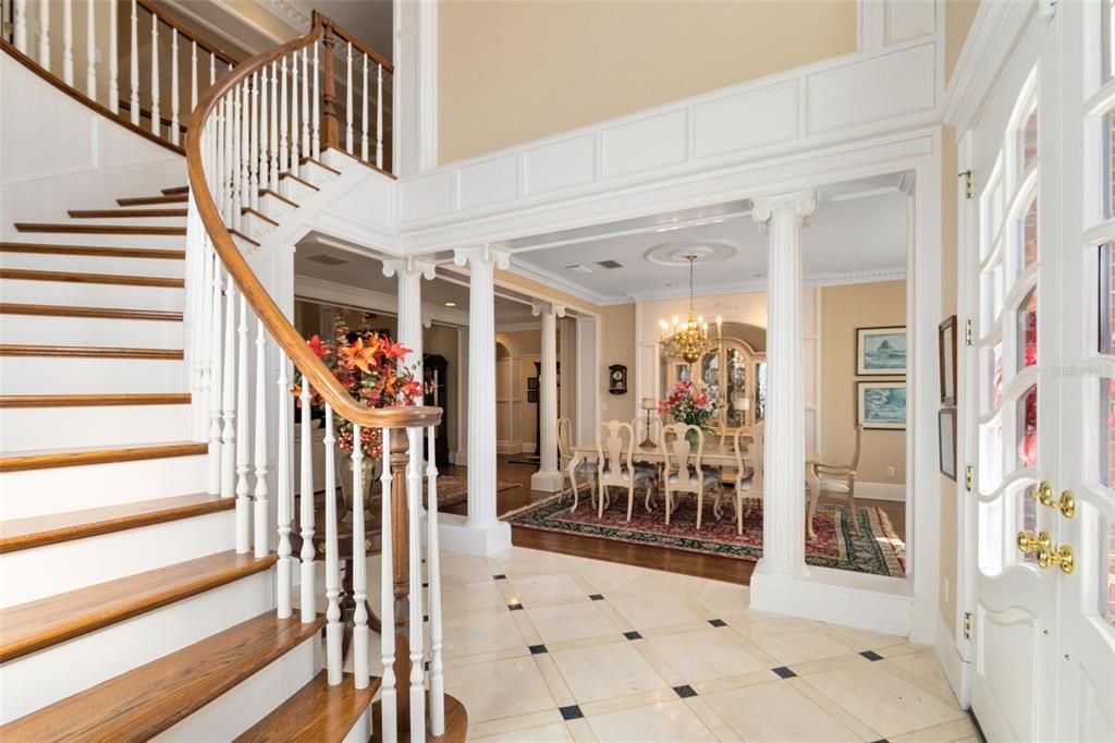 This stunning entryway sets the tone for the interior where every detail has been meticulously crafted.