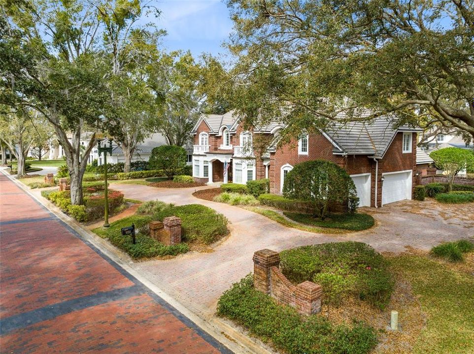 A paver circular driveway welcomes you.