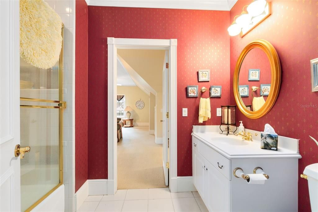 This bath is a Jack and Jill style sharing access between bedroom three and the bonus room.