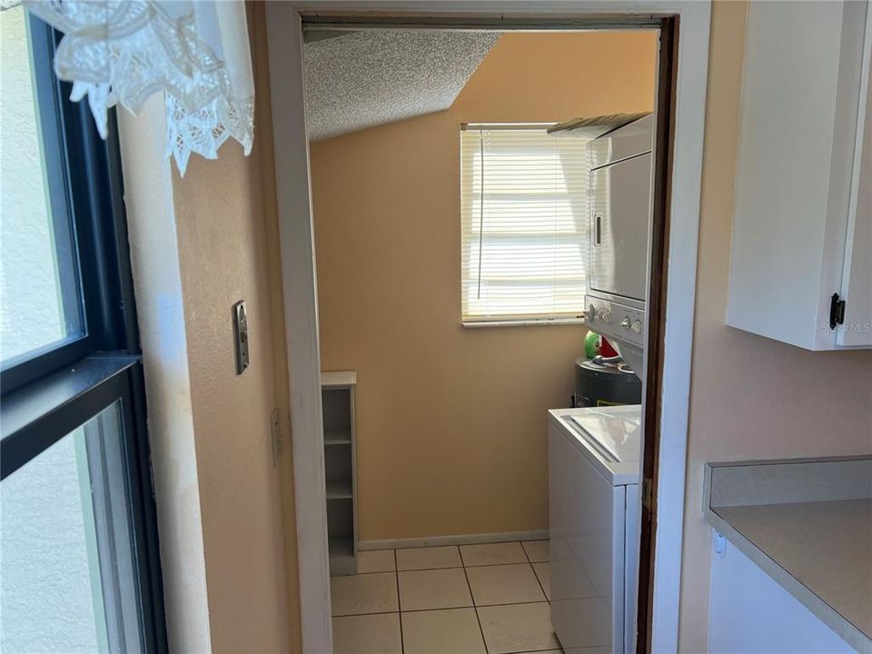 Laundry room with pocket door