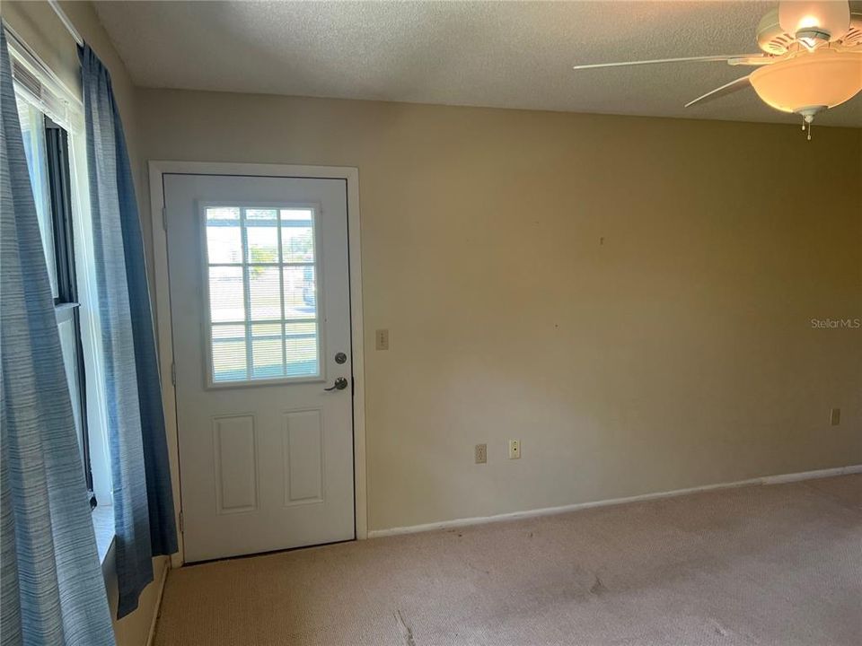 Primary bedroom with door to Lanai