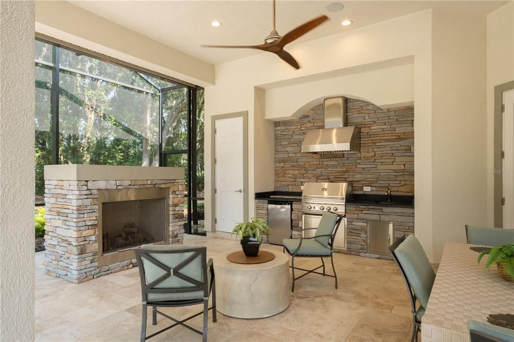 Spacious Lanai with outdoor kitchen & fireplace