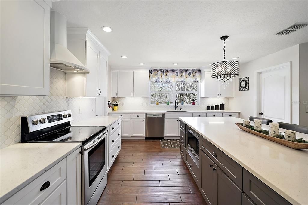 Kitchen with Shaker Style Cabinets and Quartz Countertops