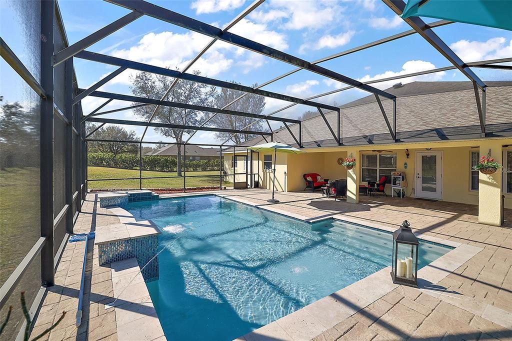 Generous Seating and Grilling Area Under Roof in the Lanai