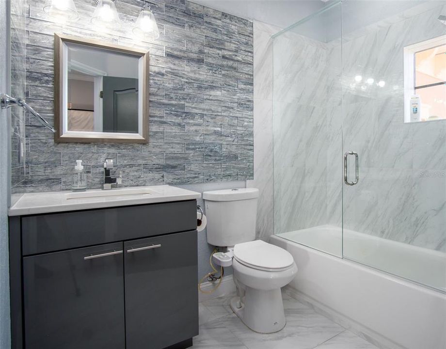 Bathrooms completely redone, custom cabinets, quartz countertopsd