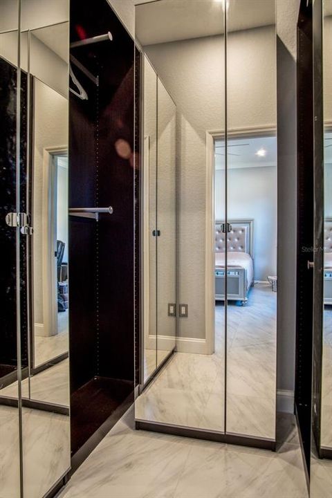 Custom Closets with floor to ceiling mirrors