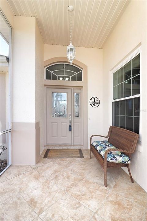 Covered, screened front porch