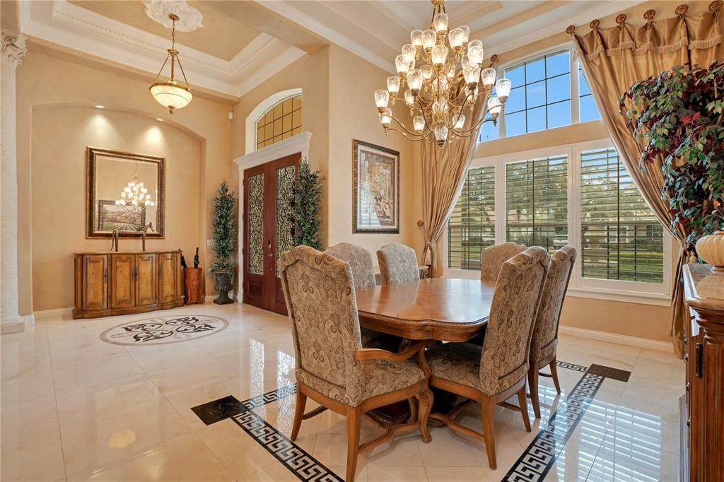 Formal dining room with walls of windows