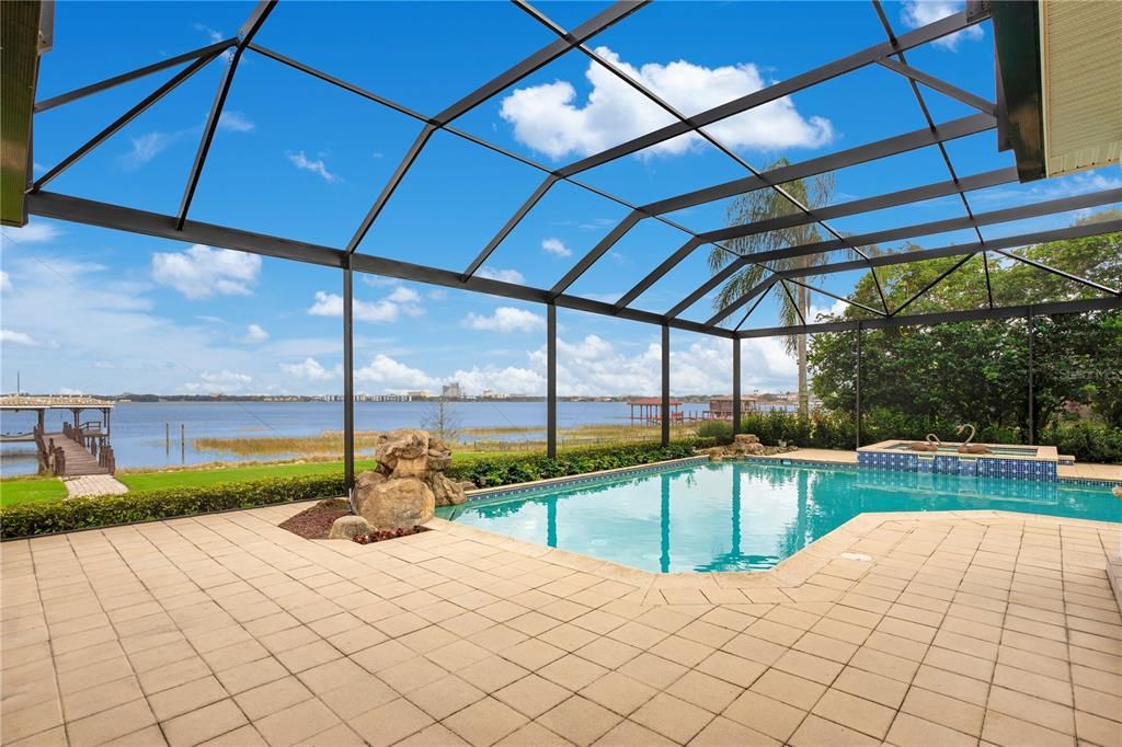 The paved area around pool to fit additional outdoor furniture