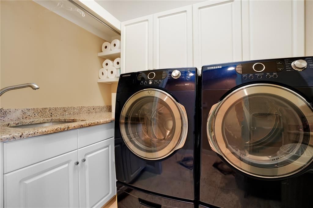 Laundry room with built-in & sink