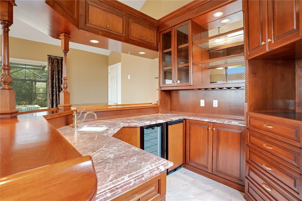 Full wet bar in great room is entertainer's dream