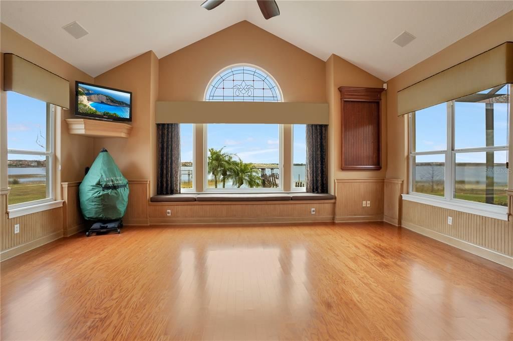 The great room/billiard room has panoramic lake view