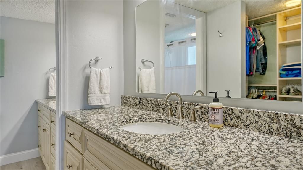 Primary bathroom with dual vanities