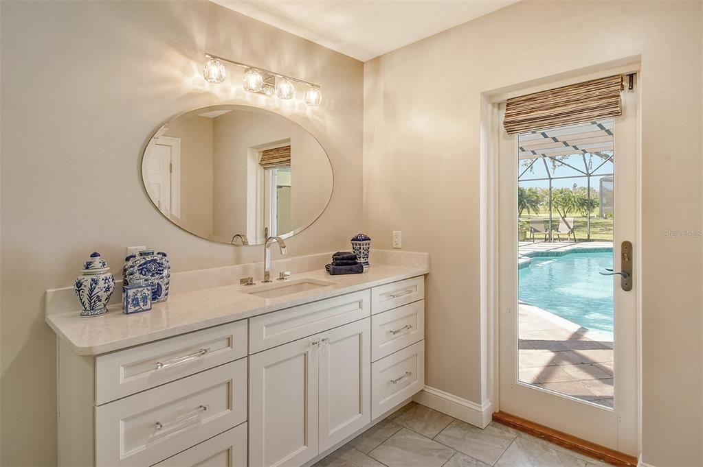 This bathroom also serves as the pool bath.