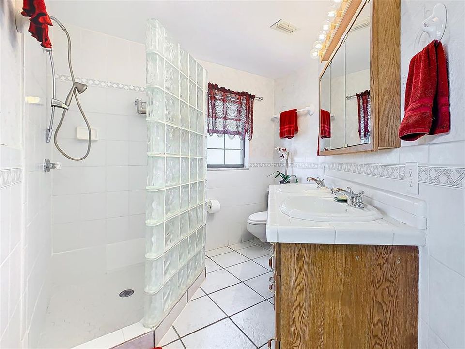 En-suite master bath has double sinks and walk-in shower.