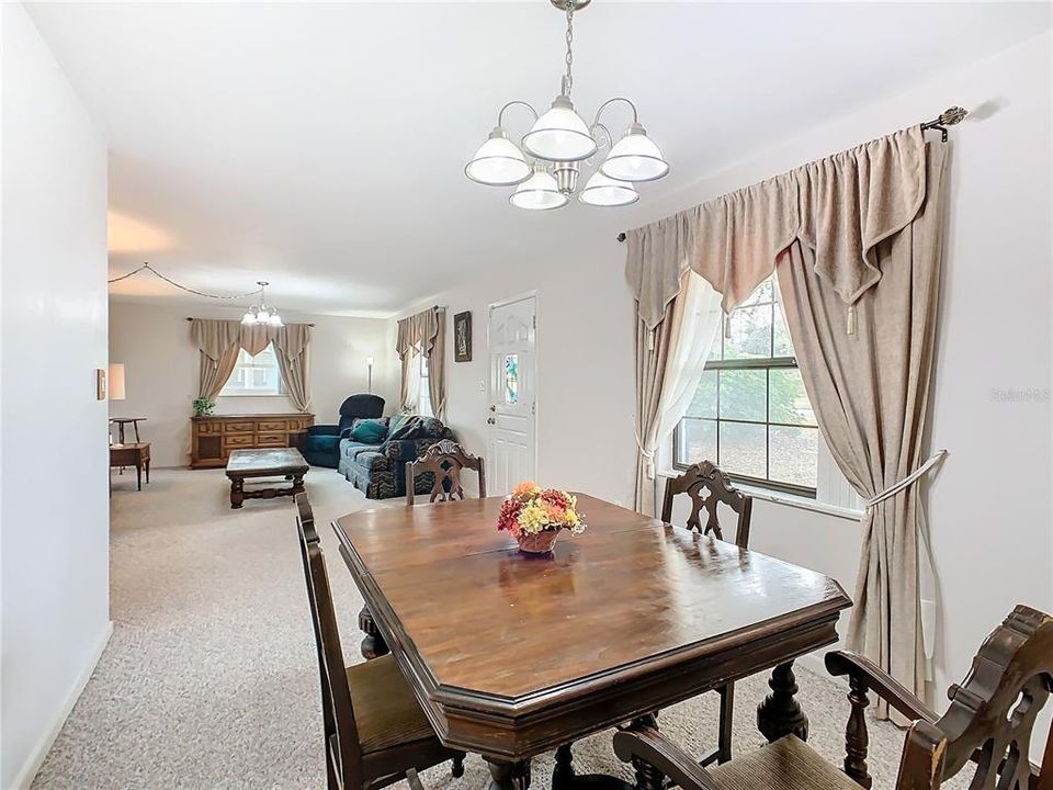 Looking towards the front door and the living room.