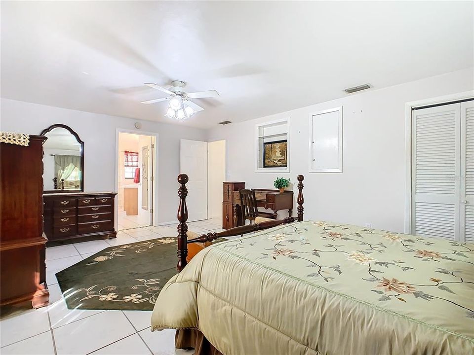 Master bedroom with en-suite bath and large walk-in closet.