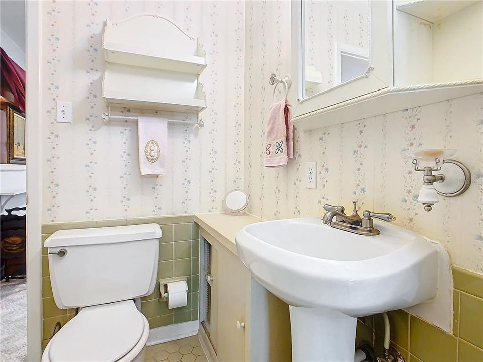 Bathroom #3 is downstairs and can be used as an en-suite bath and guest bathroom.