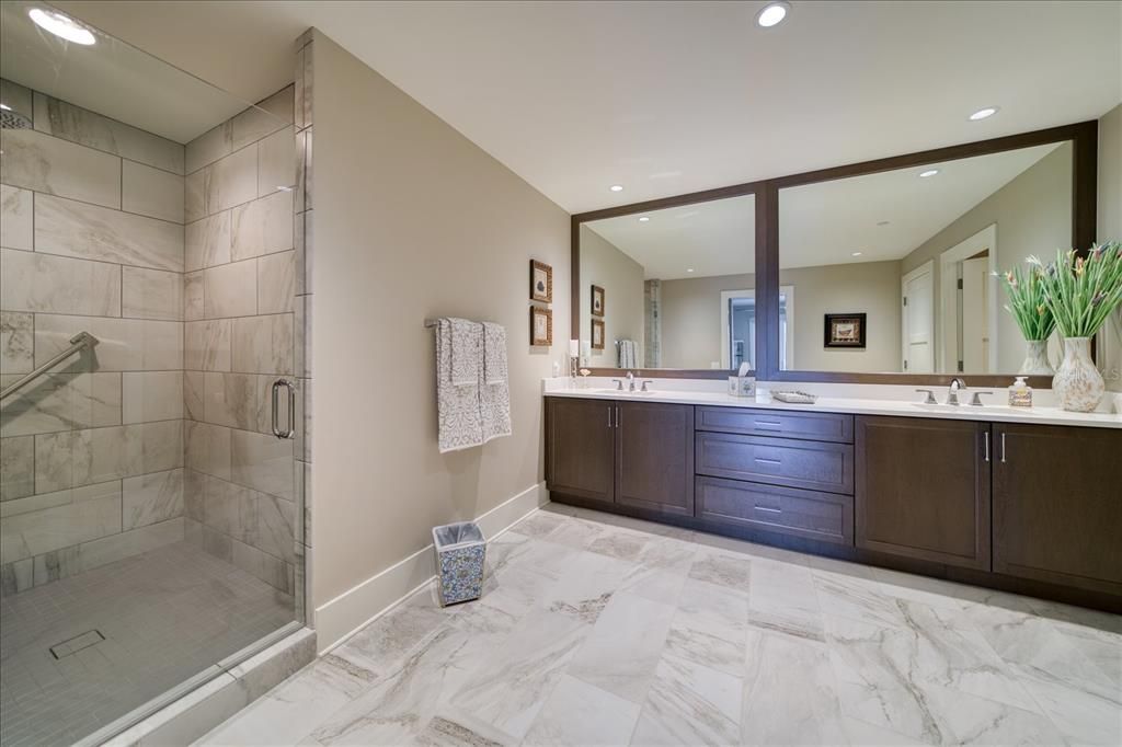 Primary bath, one of 2, with large walk in shower.