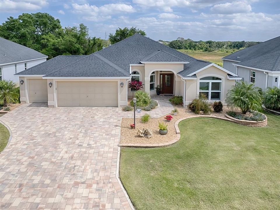 LOVELY 3/2 GARDENIA WITH GOLF CART GARAGE ON PRESERVE WITH BEAUTIFUL VIEW LOCATED IN THE VILLAGE OF PINE HILLS!