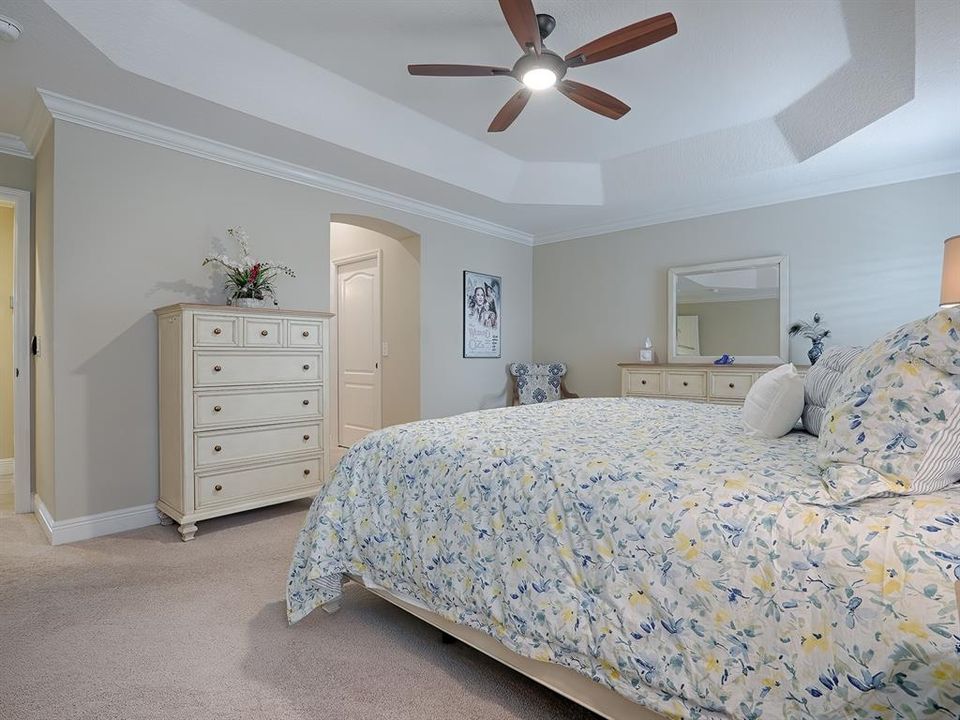 EN-SUITE BATH WITH 2 WALK-IN CLOSETS IN THE HALLWAY TO BATH WITH EXTRA SHELVING FOR MORE STORAGE.