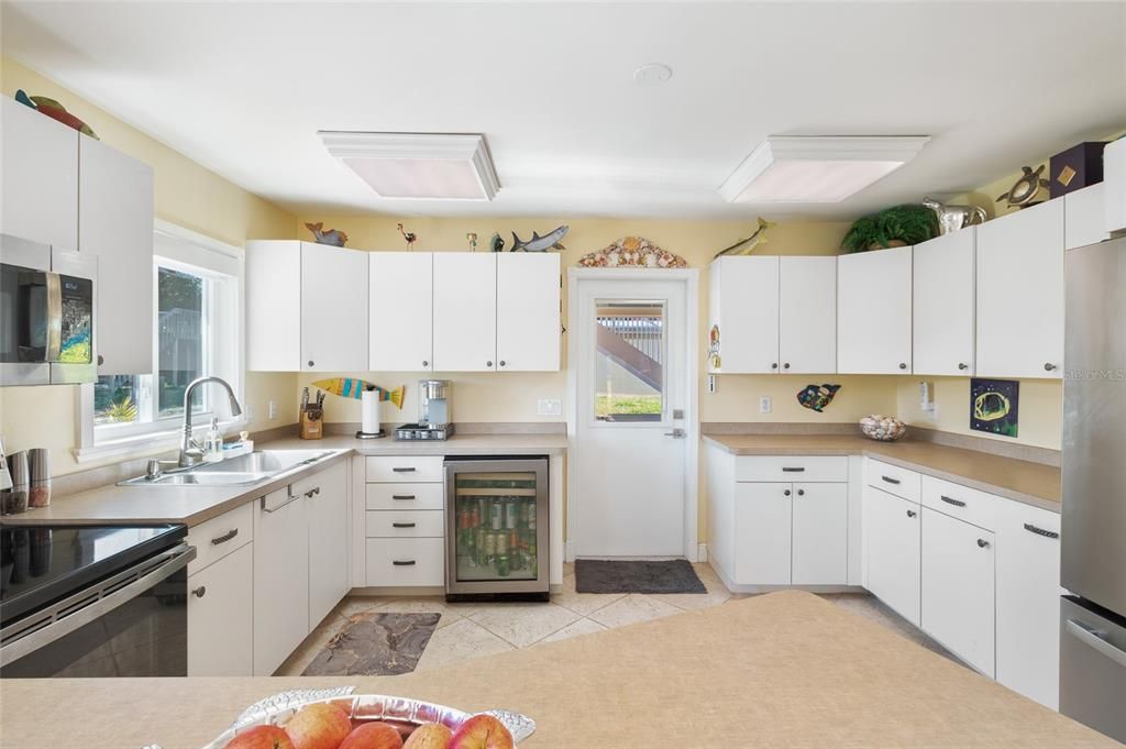 Kitchen offers stainless steel appliances and counter and cabinet space galore!