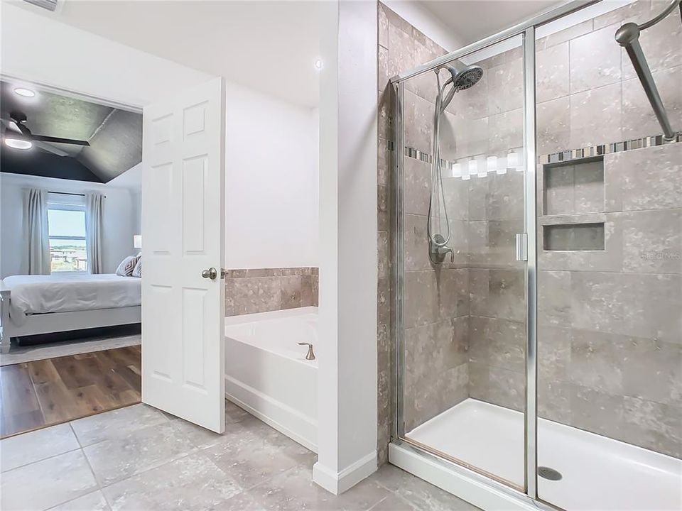 Primary Bedroom En Suite Bath with Garden Tub and Standing Shower