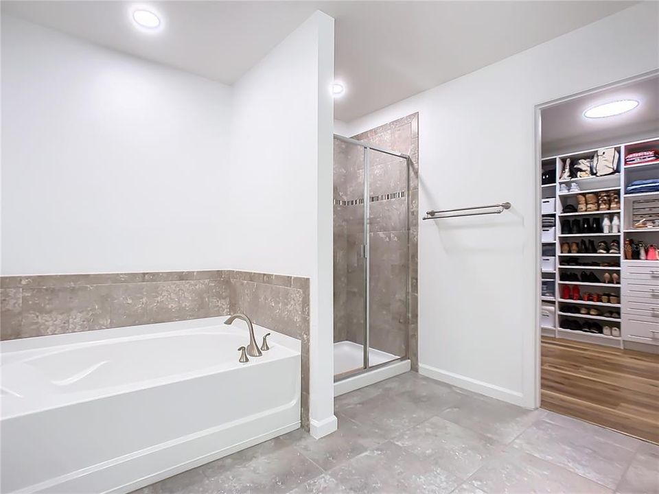 Primary Bath with Garden Tub, Standing Shower and Walk In Custom Closet
