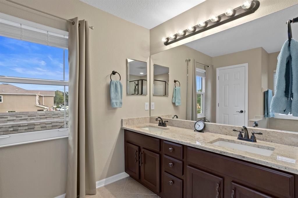 Primary bath vanity with two sinks