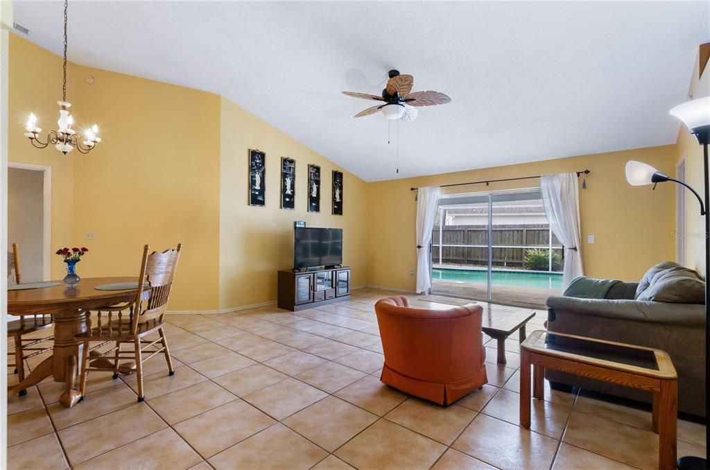 Spacious living/dining area leads to the pool & patio.