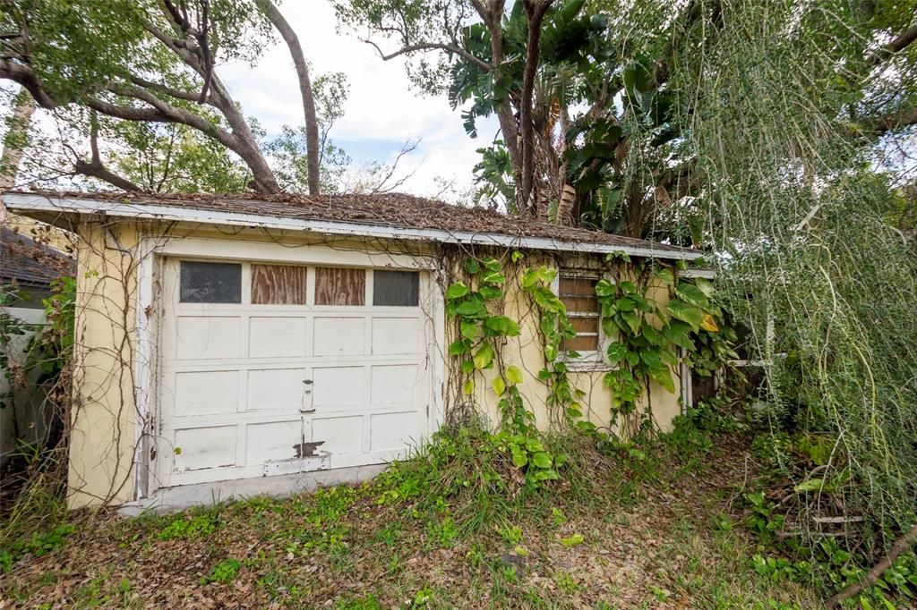 The detached garage used to have an inlaw apartment with a screened in porch - it needs a lot of love but great potential!