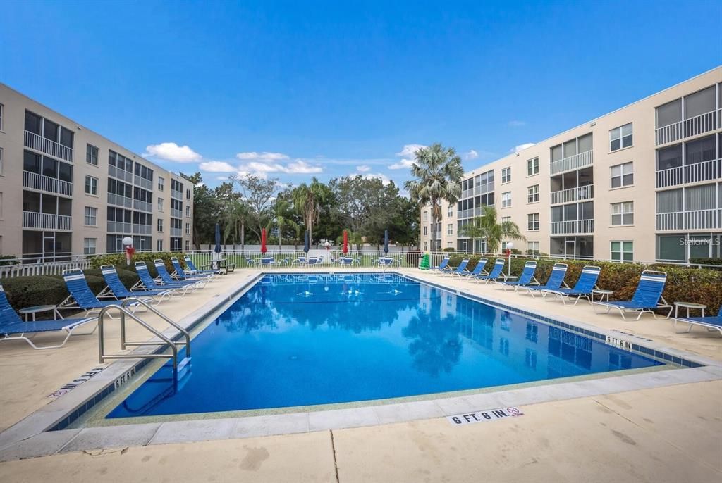 POOL TO RELAX AND ENJOY CHATTING WITH NEIGHBORS OR TO TAKE A DIP.  NO NEED TO DRIVE.