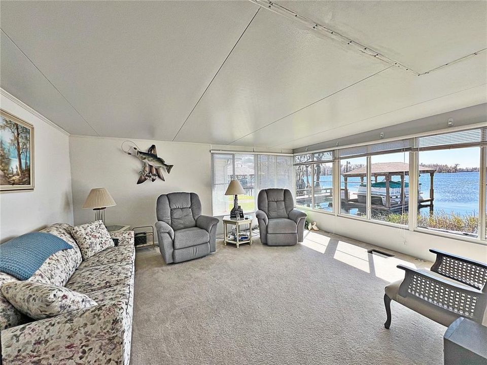 Additional view of the Family room. Located on the North side of the lake to enjoy the sunrise and sunset.