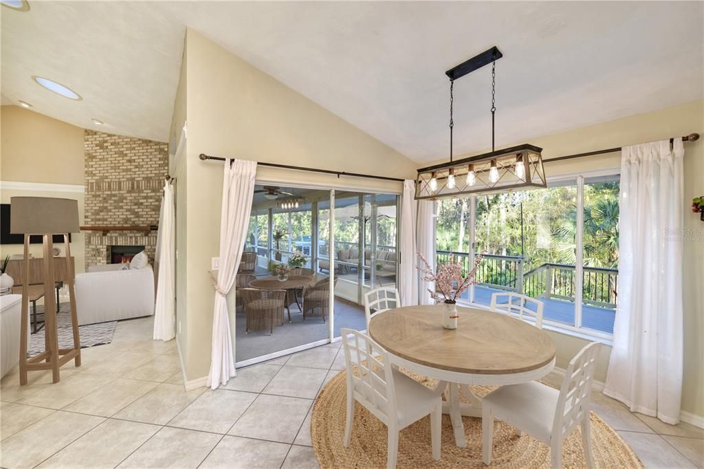 Breakfast Area to Enclosed Lanai Furniture Virtually Staged
