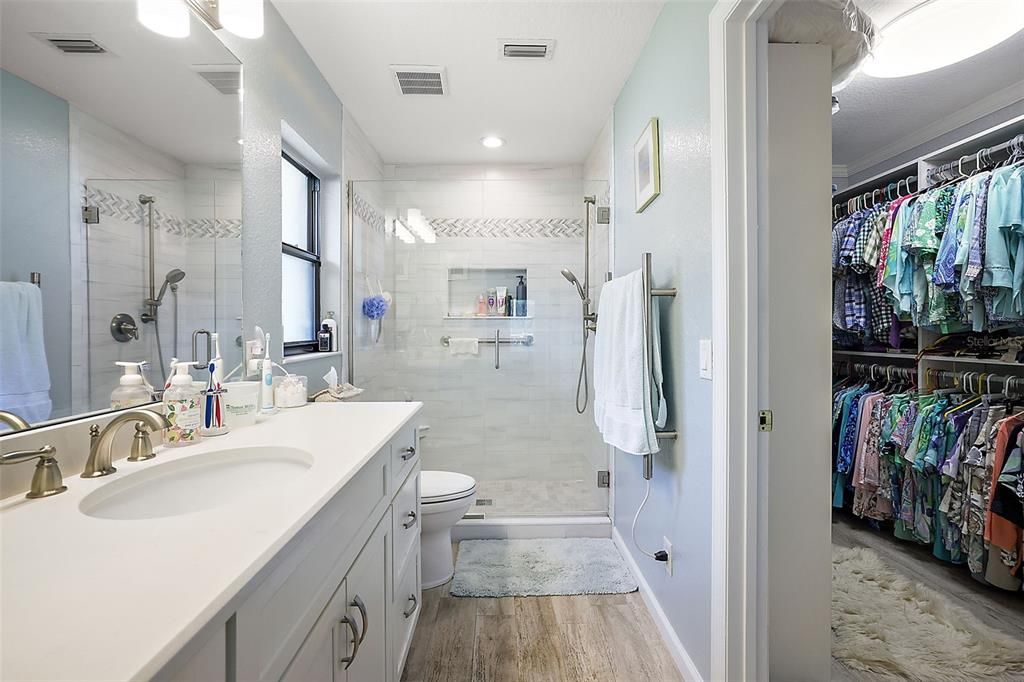 bathroom remodel done in 2018, quartz counter top, custom tile accents and towel warmer