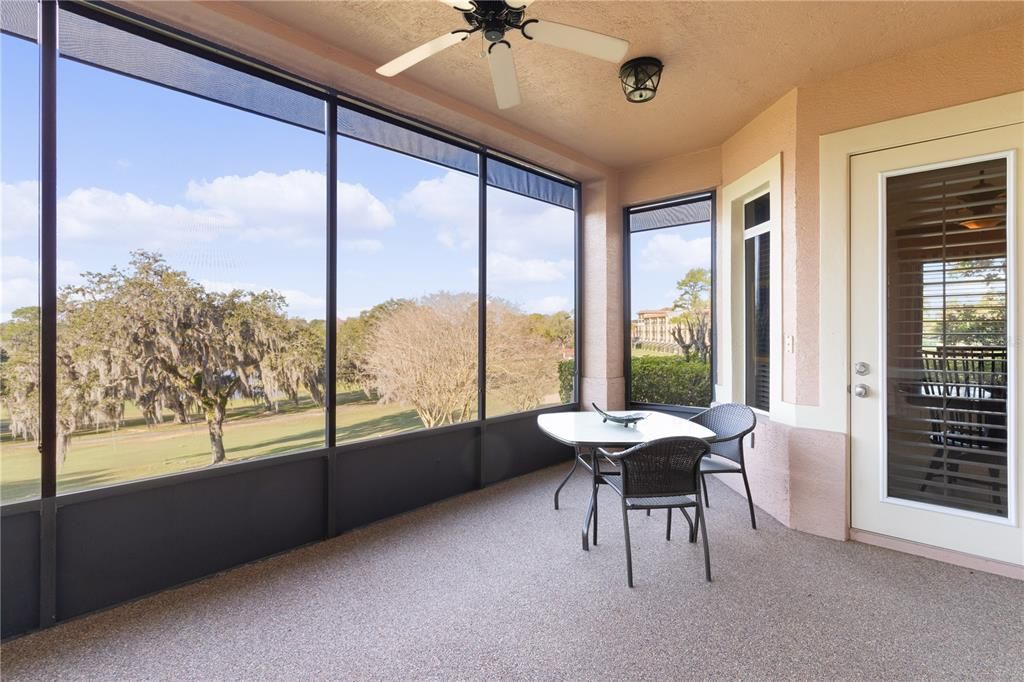 Screened in Lanai with views of the hotel and golf course