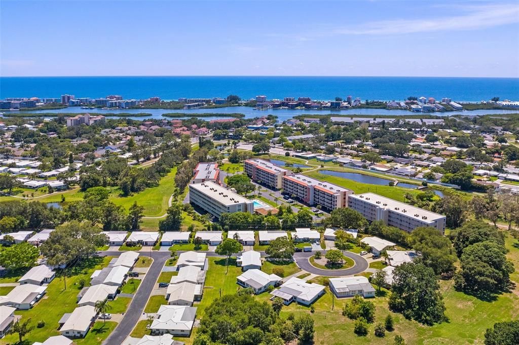 Complex in the foreground with Gulf of Mexico and Intercoastal Waterway in the background