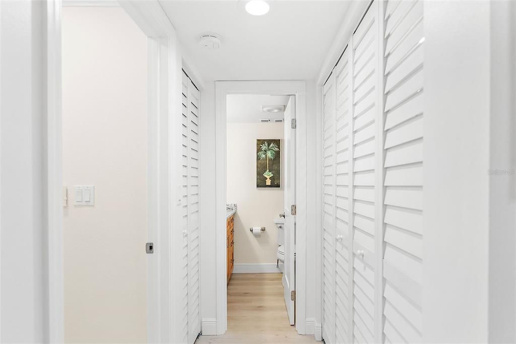 Hallway to 2nd Bedroom, Laundry Closet and guest Bathroom