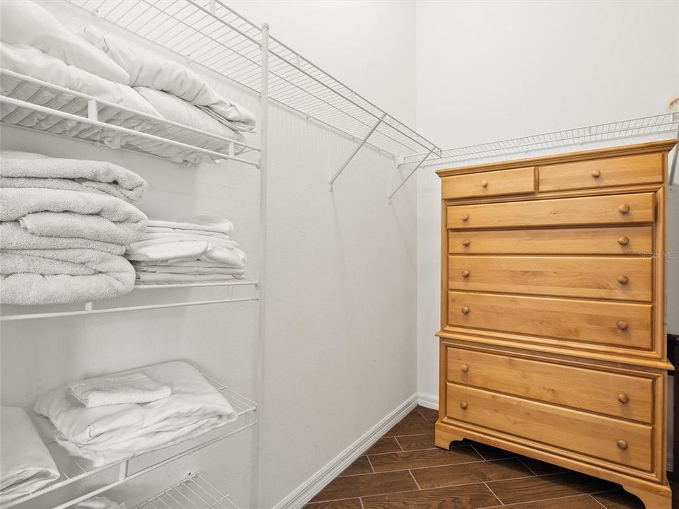 Spacious master closet with extra drawers