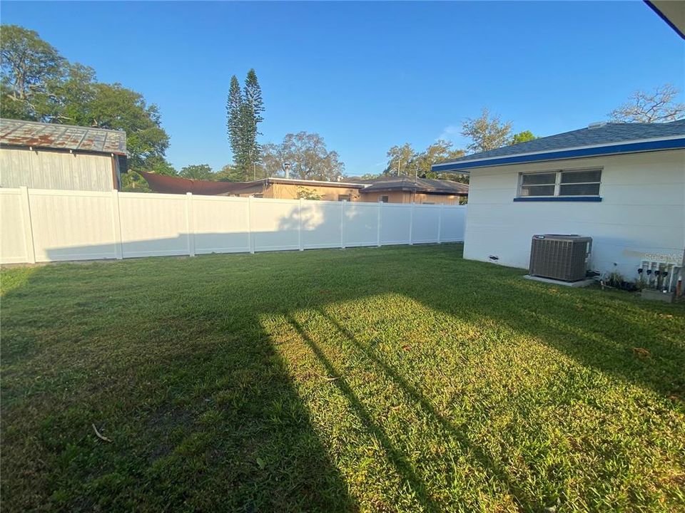 Large backyard partially fenced