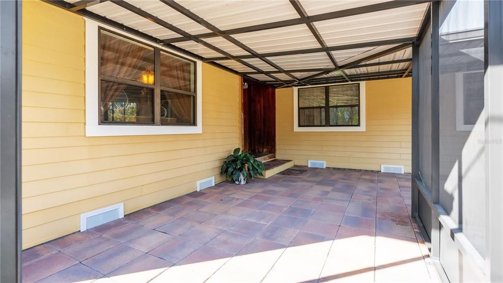 Screened patio with metal roof