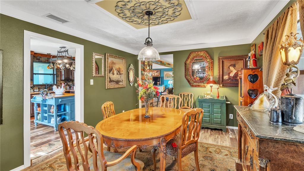 Dining room leading to kitchen