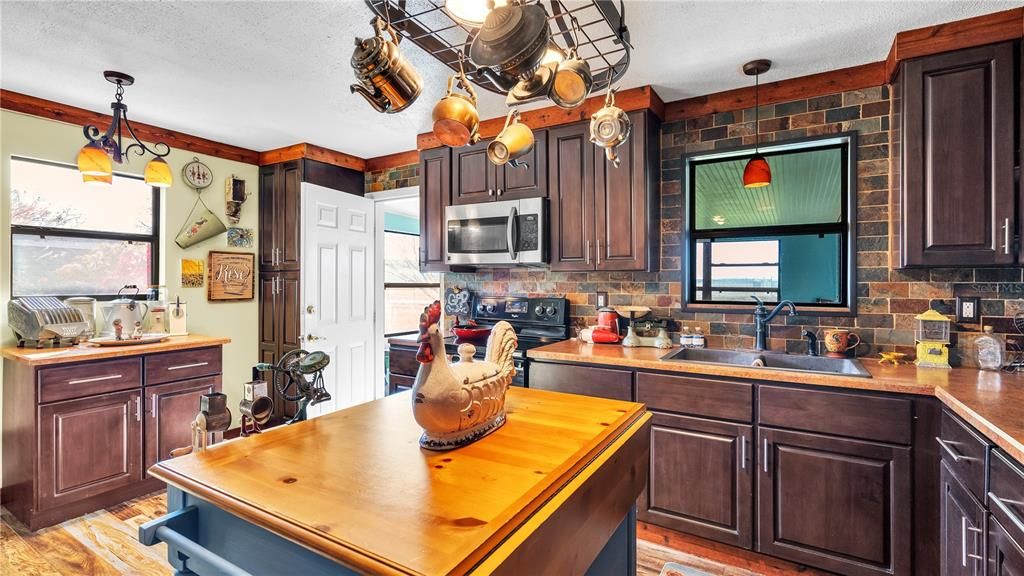 Kitchen leading to utility room