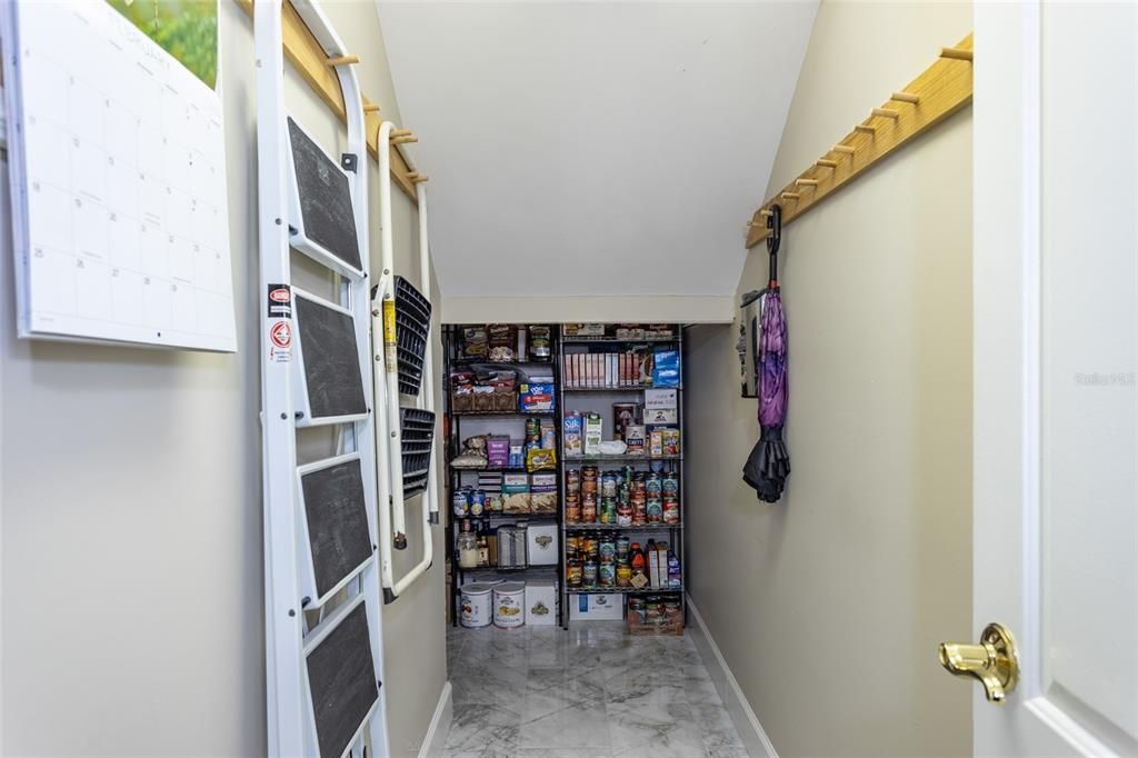 Extra storage area off the kitchen hallway