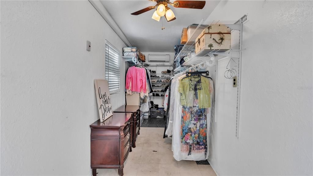 19 x 8 bonus roomThe large bonus room just off the pool area and garage is perfect flex space for a home office, gym, or even another bedroom if needed.(the seller is currently using it as a closet, however it has been used as a 4th bedroom in the past)