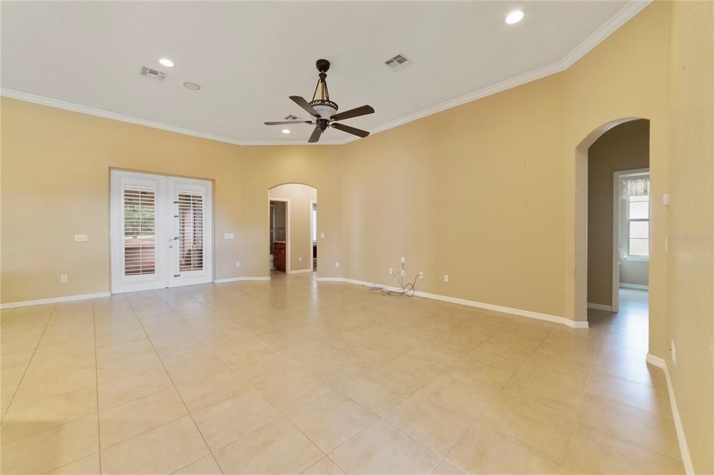 Family Room with French doors leading to huge enclosed patio